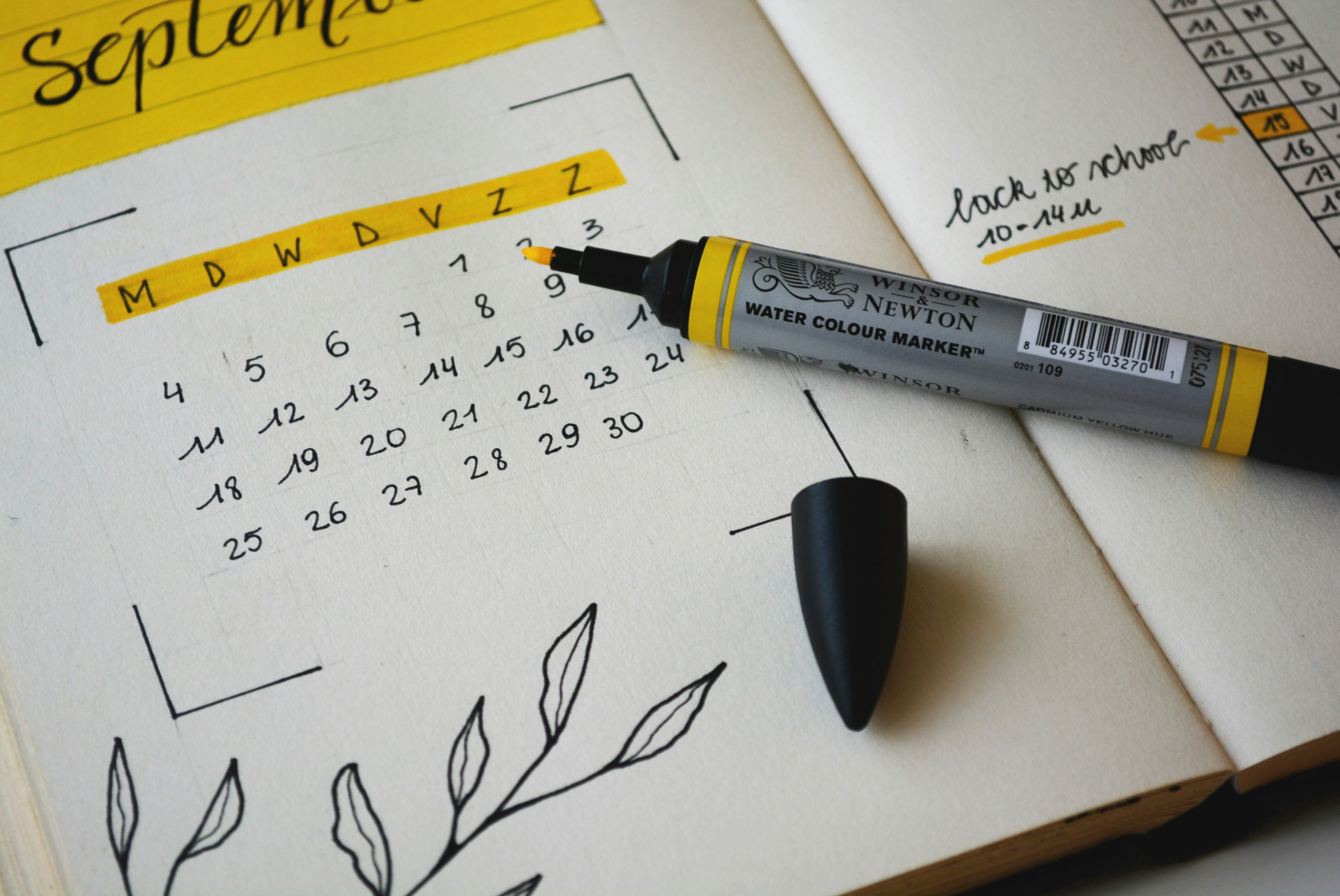 A calendar planner marked up with a schedule